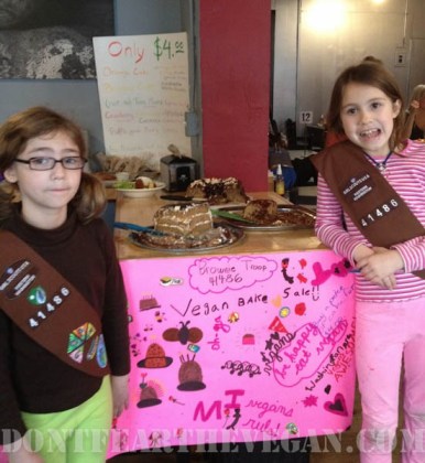 Isabel and Anzia with the awesome sign their troop created!